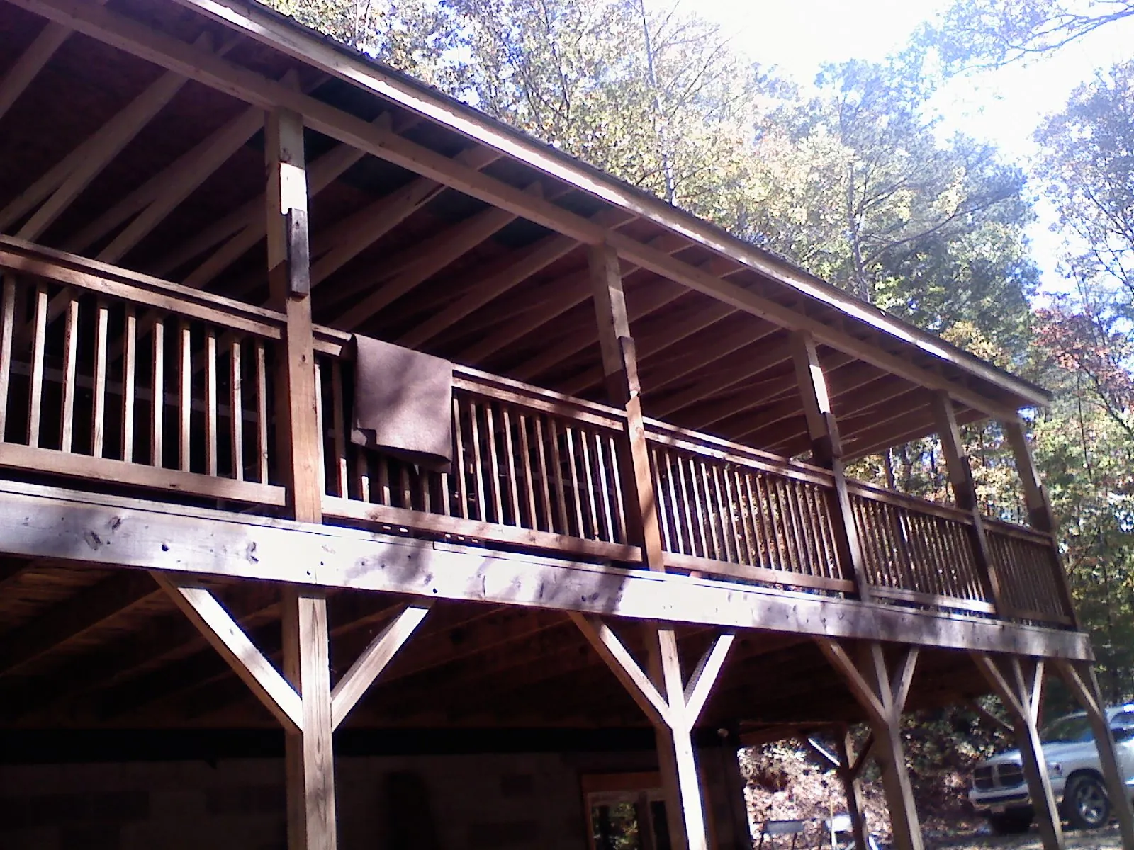 Timber framing under a new elevated porch and deck — Roof Leak Repair in Okarche by Roofing Brothers